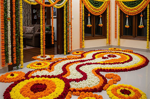 A home beautifully decorated with fresh flowers for Diwali