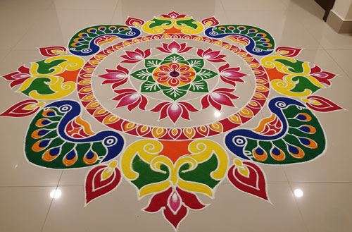 Traditional Diwali rangoli with vibrant colors.