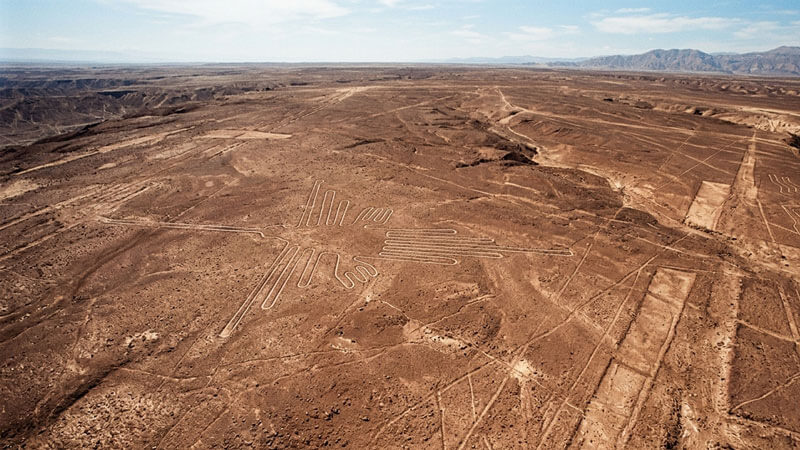 Aerial view of the Nazca Lines hummingbird geoglyph in the Peruvian desert
